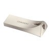 Samsung USB 3.1 flash drive packaging with text on a blurred keyboard background