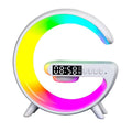 Colorful crescent moon-shaped clock with digital display on a white background