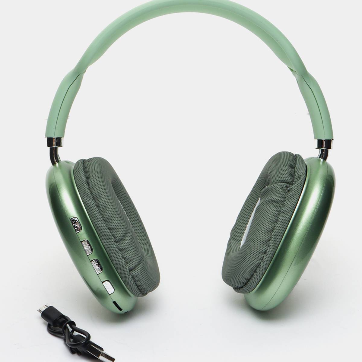 Green headphones with a cable on a white background