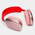 Red and pink headphones on a white background