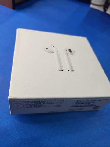 White earbuds on a white box with blue background