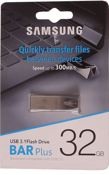 Samsung USB 3.1 flash drive packaging with text on a blurred keyboard background