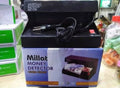 Millat money detector machine in packaging with visible branding and product details.