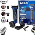 Kemei electric shaver set with packaging and attachments on a white background