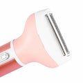 Pink and white hair removal device on a white background