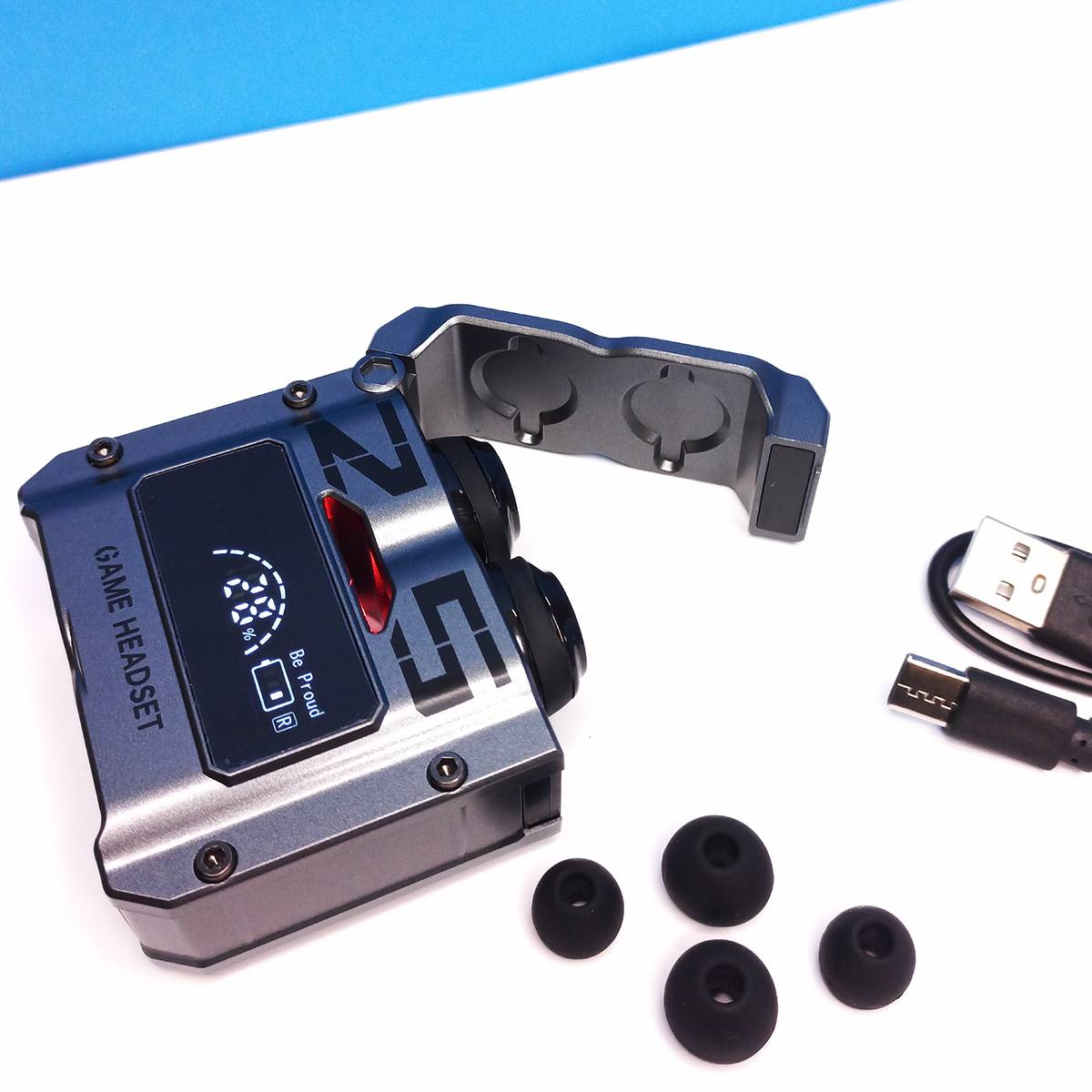 Game headset with USB cable and ear cushions on a white and blue background